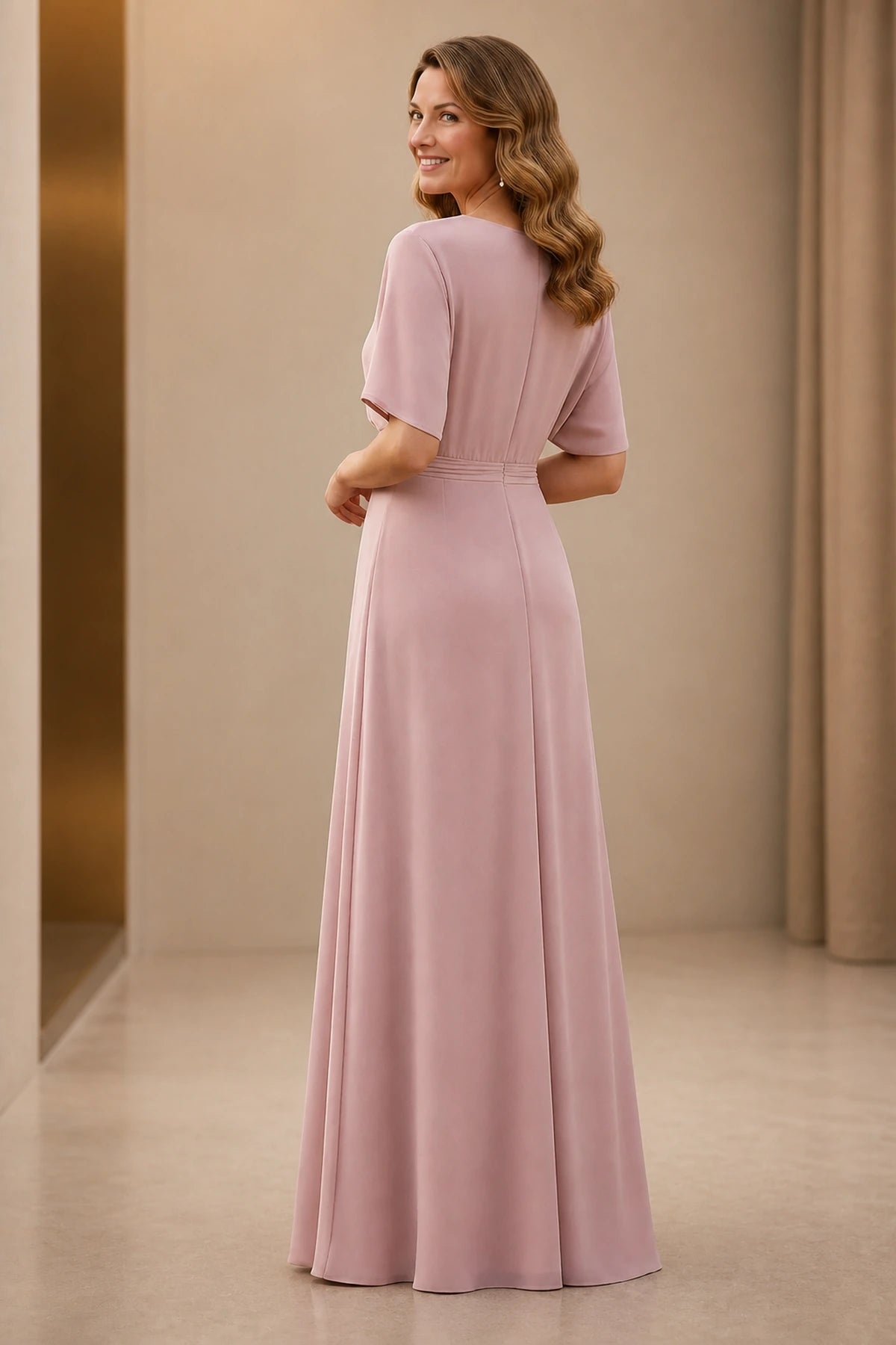 Back view of dusty rose mother of the bride dress with short sleeves, closed back and floor-length A-line silhouette