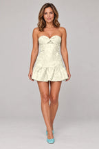 Pale yellow floral sweetheart strapless mini homecoming dress with ruffle hem by Graceprom