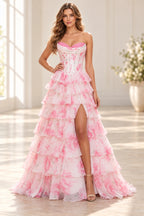 Pink floral A line prom dress with sweetheart corset bodice layered ruffles and slit