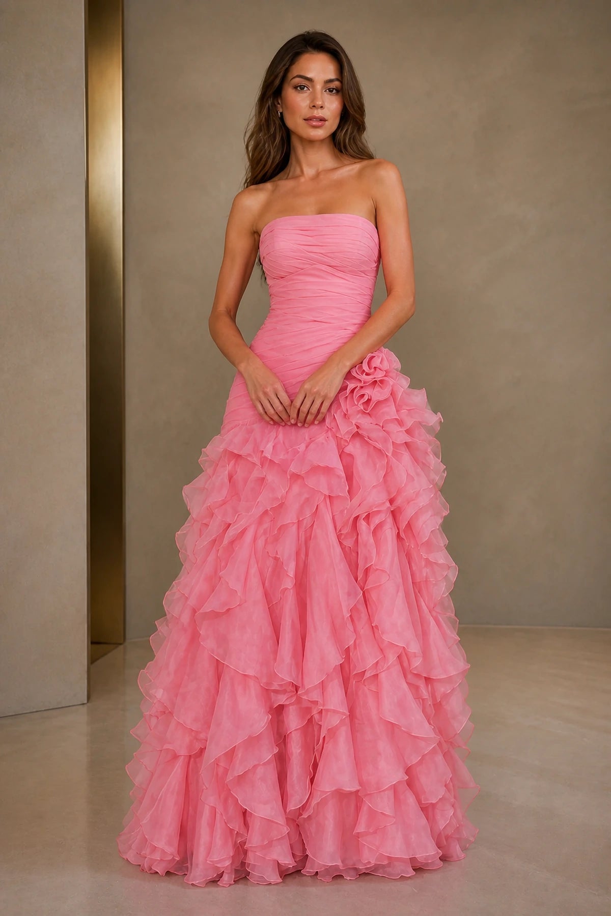 Pink sweetheart strapless floor-length bridesmaid dress with ruched bodice and tiered ruffles