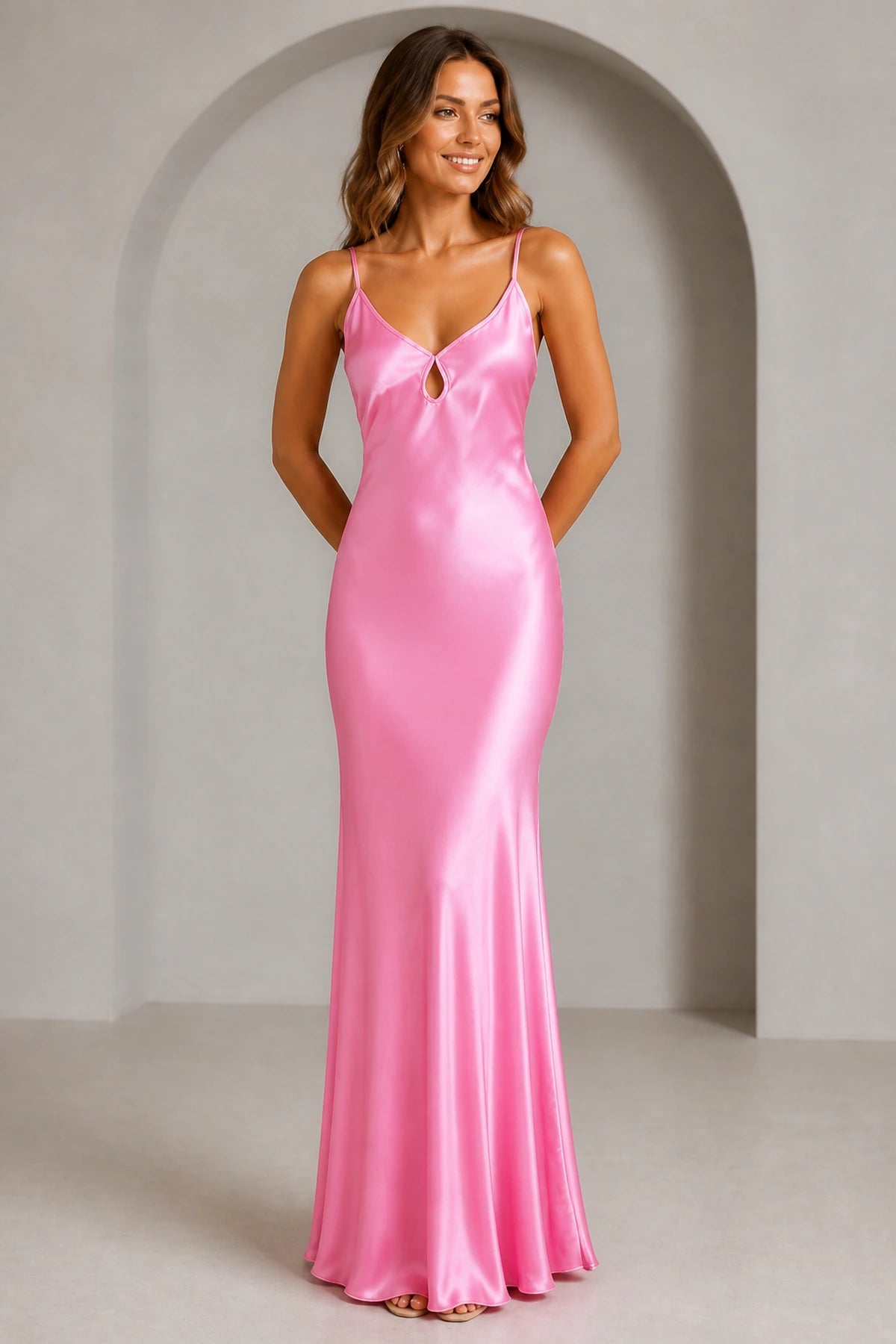 GraceProm pink satin bridesmaid dress with V neckline spaghetti straps front keyhole and floor length sheath silhouette