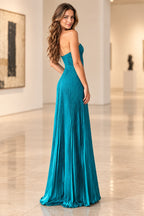Back view of Graceprom teal chiffon wedding guest dress with a low strapless back, fitted pleated waist and flowing floor length skirt.