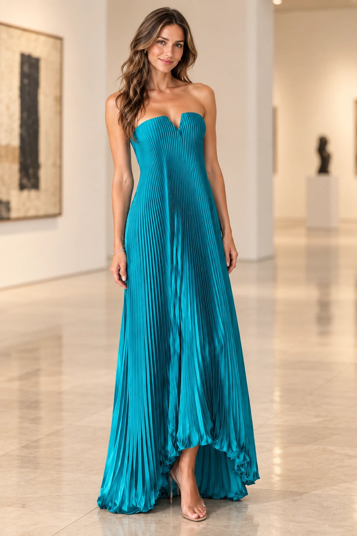 Graceprom teal chiffon wedding guest dress with a strapless V-notched neckline, accordion pleats and an ankle-revealing high low hem.