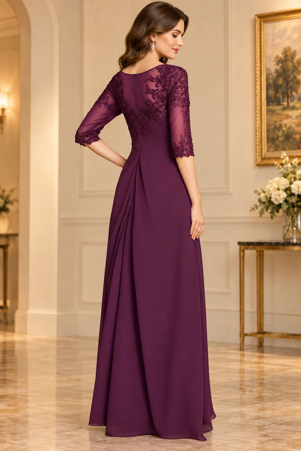 Back view of plum mother of the bride dress with lace illusion sleeves and elegant floor length A-line silhouette