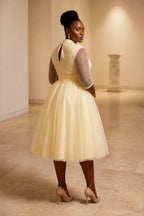 Plus size ivory formal dress with keyhole back and tea length tulle skirt