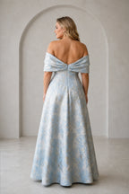 Plus size light blue formal dress with off shoulder back and flowing long skirt