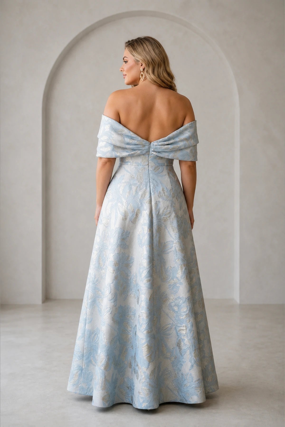 Plus size light blue formal dress with off shoulder back and flowing long skirt