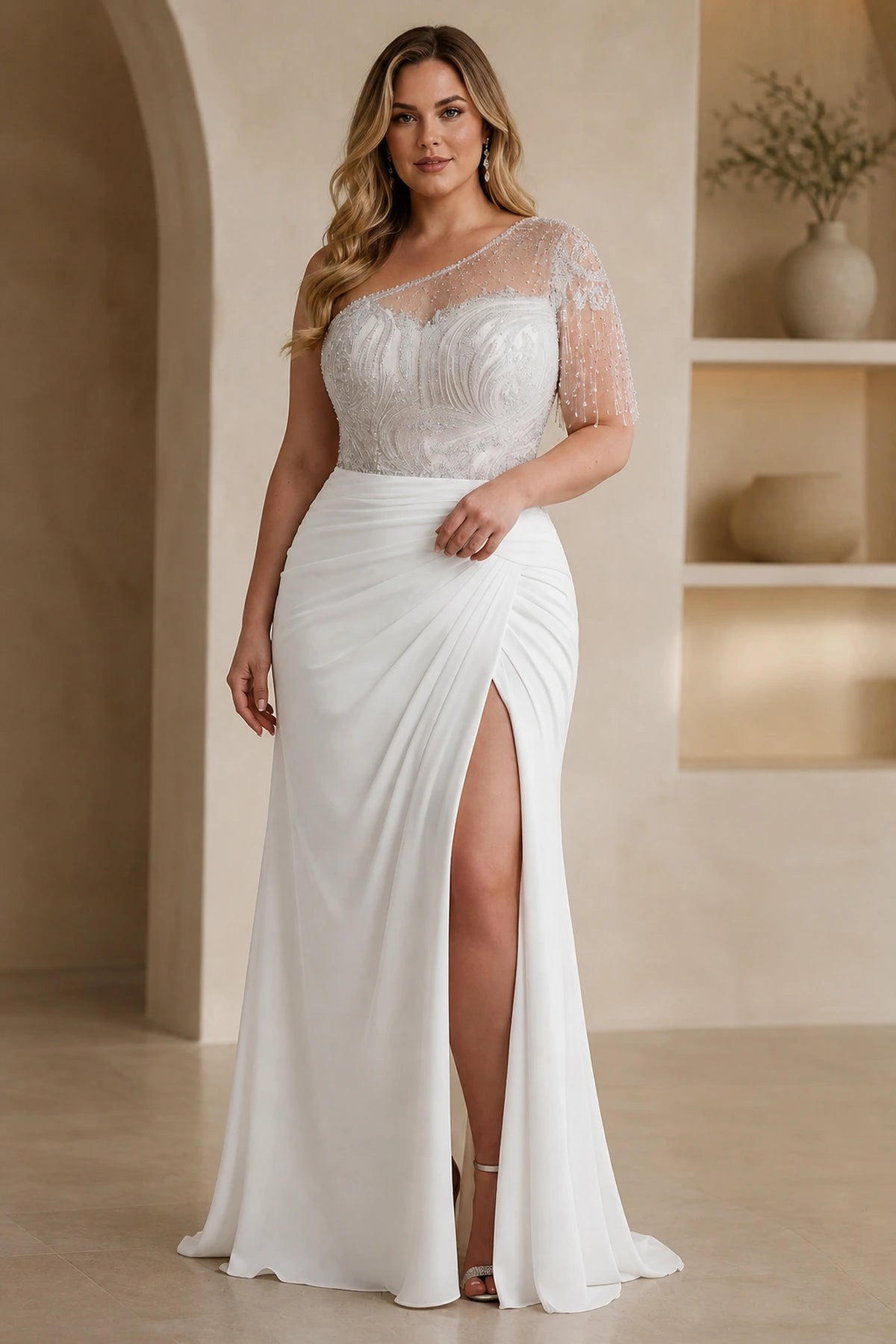 White one-shoulder plus size wedding guest dress with beaded fringe and front slit