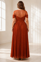Plus size rust wedding guest dress with sheer back and center zipper