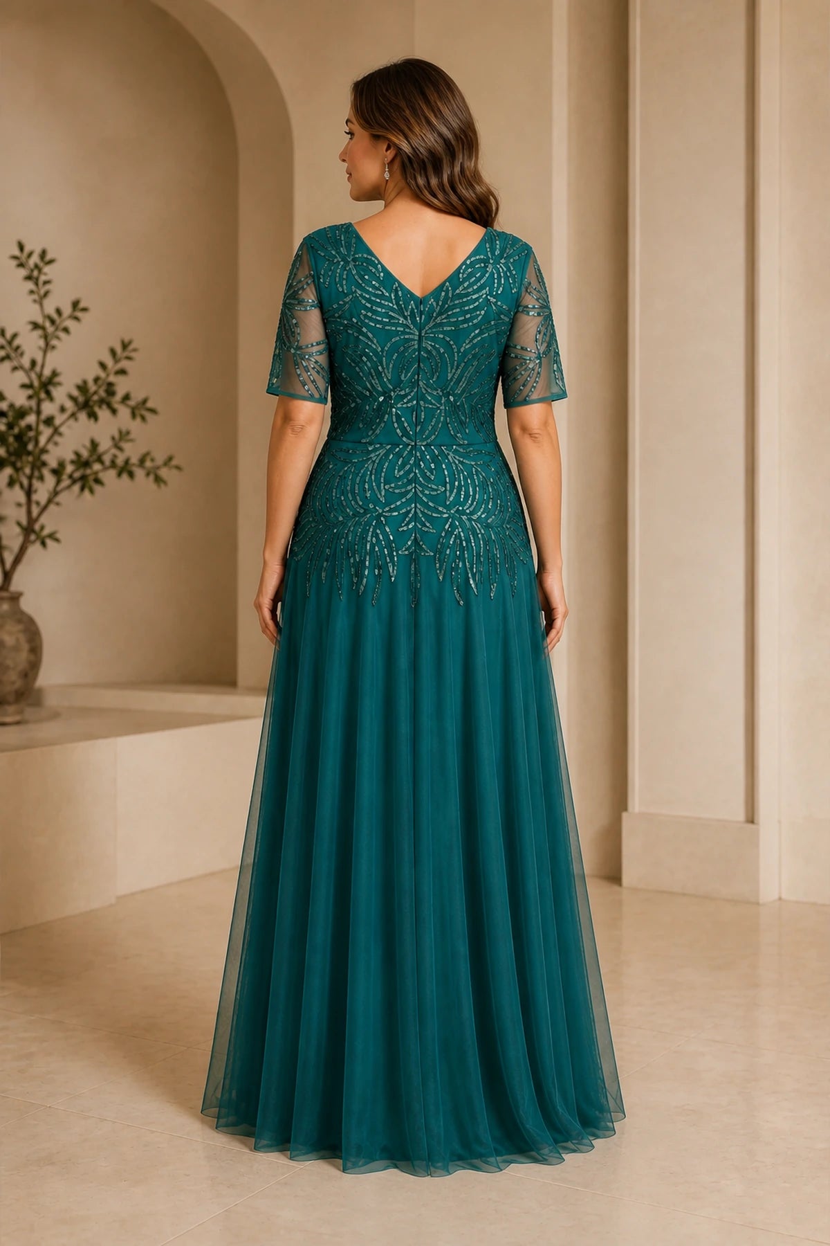 Plus size teal formal mother dress with V back and flowing long skirt