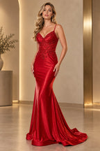 Red mermaid prom dress featuring a sweetheart neckline, spaghetti straps, beaded floral lace bodice, shimmering satin-look skirt, and sweeping train by Graceprom.