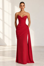 Red strapless sweetheart floor length wedding guest dress with draped waist front view