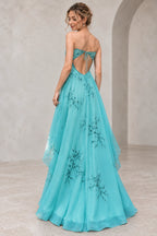 Graceprom chiffon prom gown with open tie-back design, embroidered bodice, flowing A-line skirt, and floor-length hem, back view