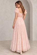 Blush pink floral tulle A-line wedding guest dress back view featuring puff sleeves, scoop back, lace waistband and flowing floor-length embroidered skirt