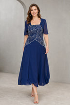 Royal blue A-line Mother of the Bride dress with square neckline, geometric beaded bodice, chiffon shrug and tea-length skirt, front and back view by Vedress