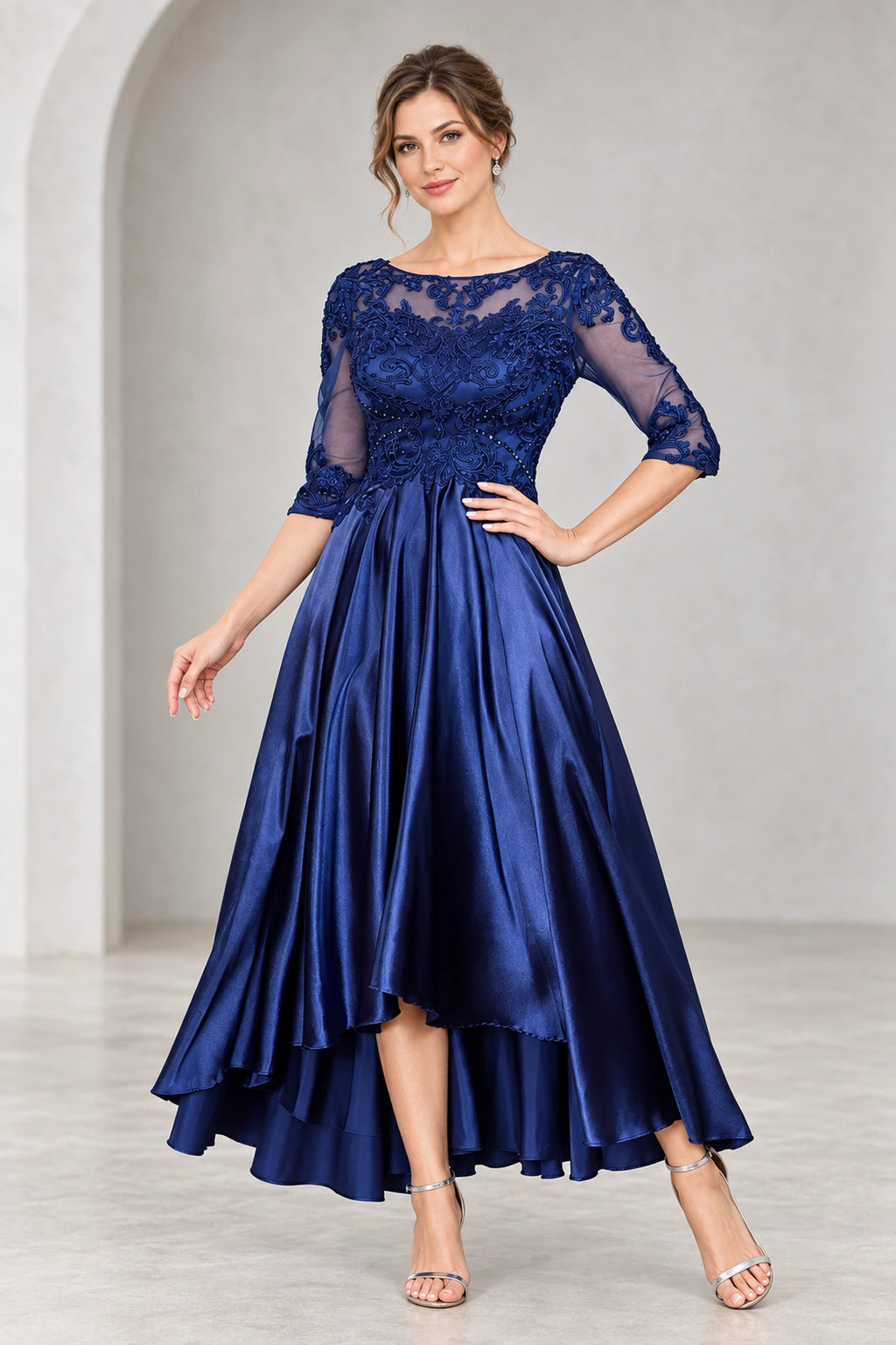 Royal blue mother of the bride dress with lace illusion neckline three quarter sleeves and high low skirt