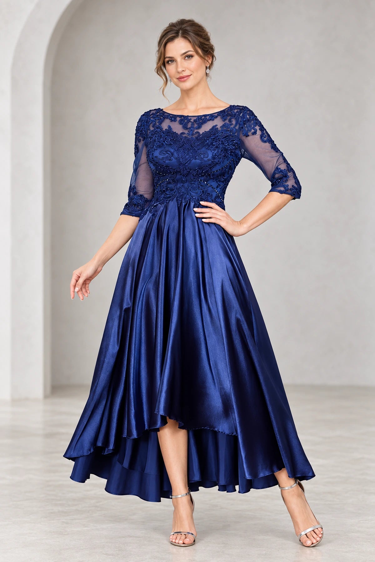 Royal blue mother of the bride dress with lace illusion neckline three quarter sleeves and high low skirt