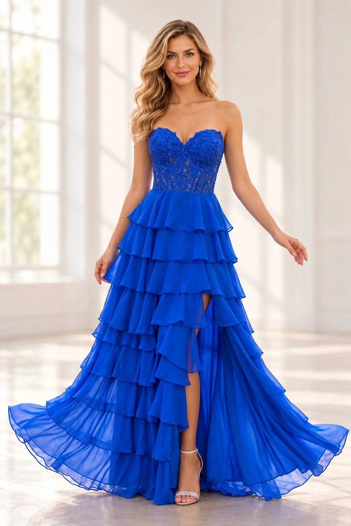 Royal blue A-line prom dress featuring a strapless sweetheart neckline, floral lace corset, cascading tiered chiffon ruffles, and thigh-high slit by Graceprom.