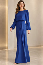 Royal blue mother of the bride dress with V neckline long sleeves and flowing A line skirt