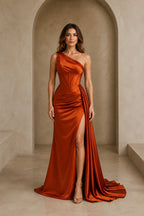 Rust orange bridesmaid dress with one-shoulder neckline, structured bodice, ruched waist, high slit and floor-length skirt front view