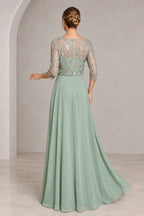 Back view of sage green mother of the bride dress with sheer beaded illusion back three-quarter sleeves center zipper and flowing A-line skirt