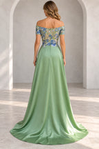 Back view of sage green Mother of the Bride Dress with floral embroidered bodice and flowing floor-length skirt