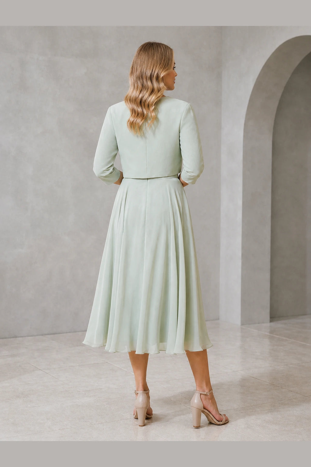 Vedress sage green mother of the bride dress with bolero jacket modest back and flowing midi A-line skirt back view