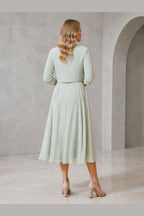 Vedress sage green mother of the bride dress with bolero jacket modest back and flowing midi A-line skirt back view