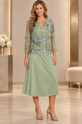 Sage green A-line Mother of the Bride Dress with scoop neckline, three-quarter sleeves, floral embroidered overlay and tea-length skirt