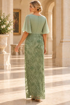 Back view of sage green Mother of the Bride Dress with cape sleeves, center zipper and floral lace skirt