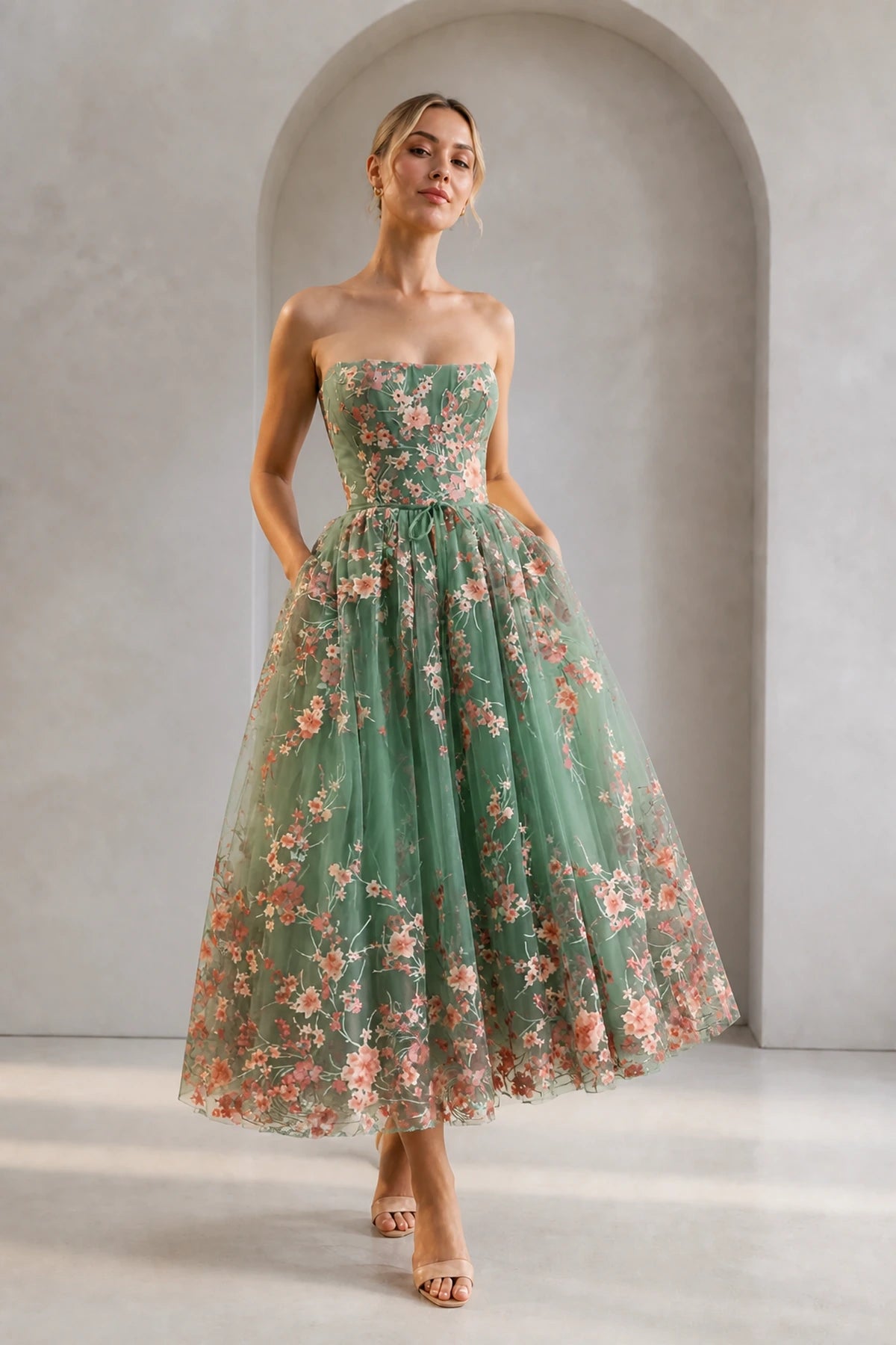 Back view of GraceProm sage green floral lace-up midi wedding guest dress