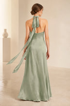 Sage green halter neck bridesmaid dress with keyhole front, tie back, side slit and floor-length A-line skirt, front and back view