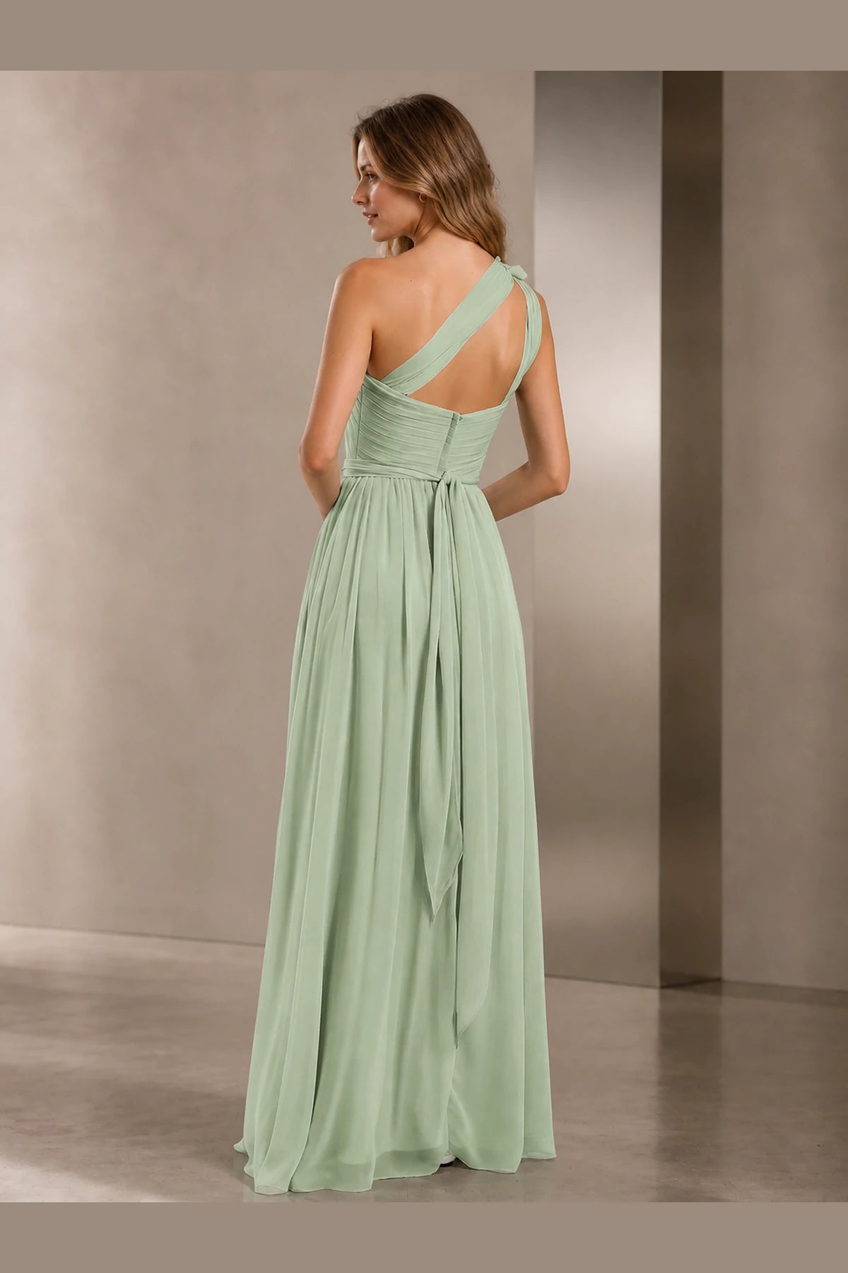 Sage green one shoulder A-line bridesmaid dress with floral detail and open back by Vedress