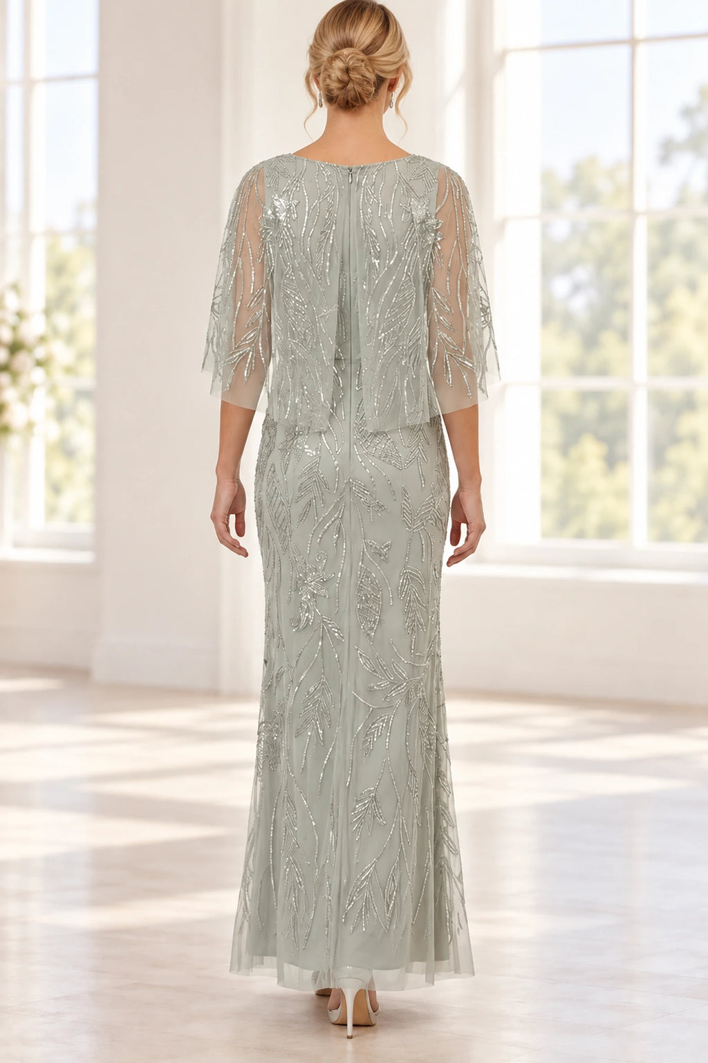 Sage silver mother of the bride dress with beaded cape back and floor length embellished skirt