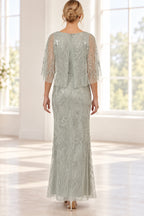 Sage silver mother of the bride dress with beaded cape back and floor length embellished skirt