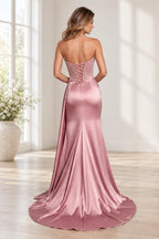 Back of Graceprom dusty rose satin prom dress with beaded sheer corset panels, crisscross lacing and a flared skirt with a sweeping train.