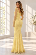 Back view of a pale yellow Graceprom satin and lace evening dress with a low scoop back, center zipper, beaded motifs and floor-length mermaid skirt.