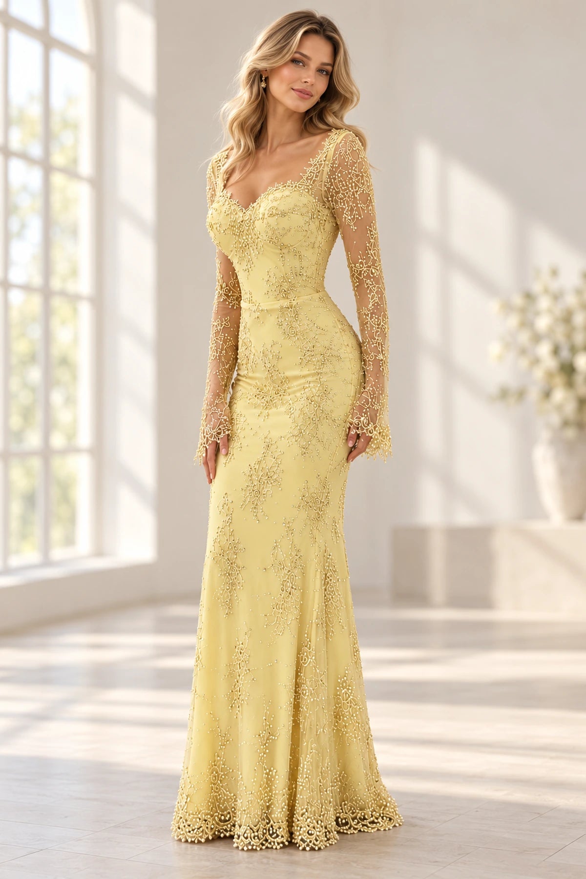 Front view of a pale yellow Graceprom satin and lace mermaid evening dress with a sweetheart neckline, sheer long sleeves and scalloped lace hem.