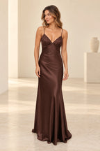 Chocolate brown satin and lace mermaid evening dress with plunging V neckline, spaghetti straps, floral lace bodice and flowing floor length skirt by Graceprom