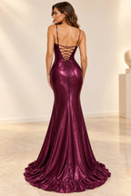 Back view of a plum Graceprom satin prom dress with adjustable spaghetti straps, an open lace-up back and a ruffle-edged sweeping train.