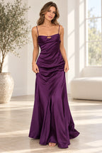 Deep purple satin mermaid prom dress with spaghetti straps, sweetheart-inspired neckline, small bust cutout, fitted bodice and floor length skirt by Graceprom