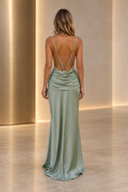 Back view of a sage green Graceprom satin bridesmaid dress with adjustable thin straps, a deeply open back and draped cowl folds at the waist.