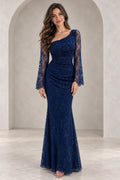 Graceprom navy blue sequin mermaid prom dress with an asymmetric neckline, sheer floral long sleeves and ruched waist detailing.