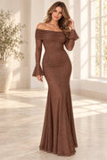 Elegant sequin wedding guest dress with off shoulder neckline, mermaid silhouette, long bell sleeves, and floor length hem.