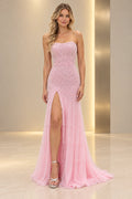 Light pink sequin prom dress with a strapless neckline, fitted sheath silhouette, thigh-high slit, and floor-length hem.