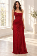 Graceprom red sequin prom dress with a strapless draped neckline, diagonal waist ruching and a fitted floor length sheath skirt.