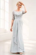 Silver gray mother of the bride dress with floral lace bodice, sheer half sleeves, ruched waist and layered floor-length skirt, front and back view