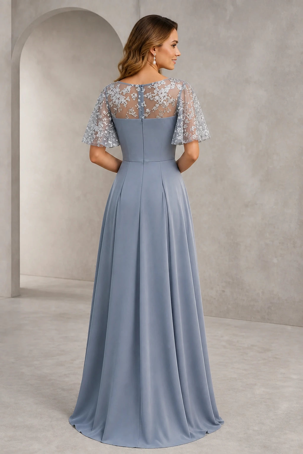 Back view of silver gray mother of the bride dress with sheer lace back, flutter sleeves, center zipper and A-line skirt