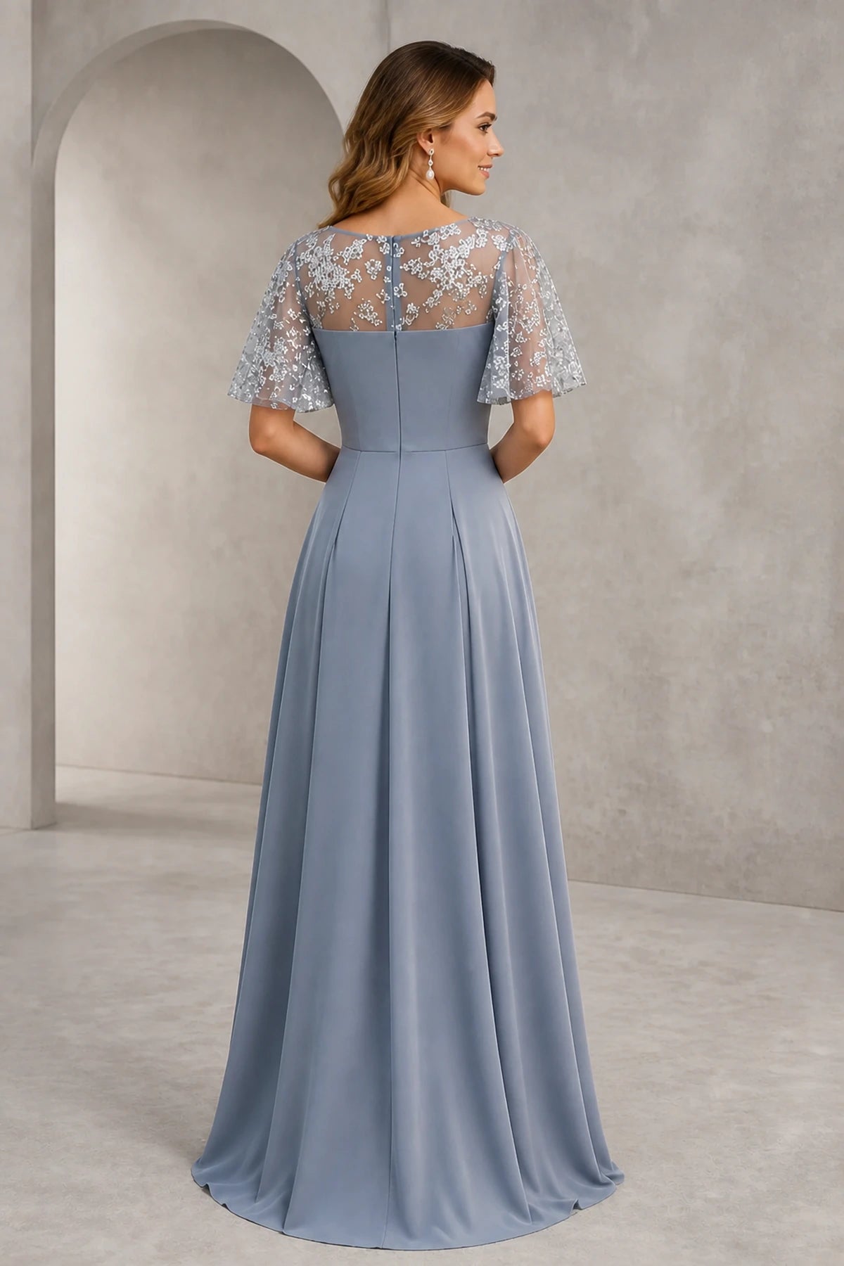 Back view of silver gray mother of the bride dress with sheer lace back, flutter sleeves, center zipper and A-line skirt