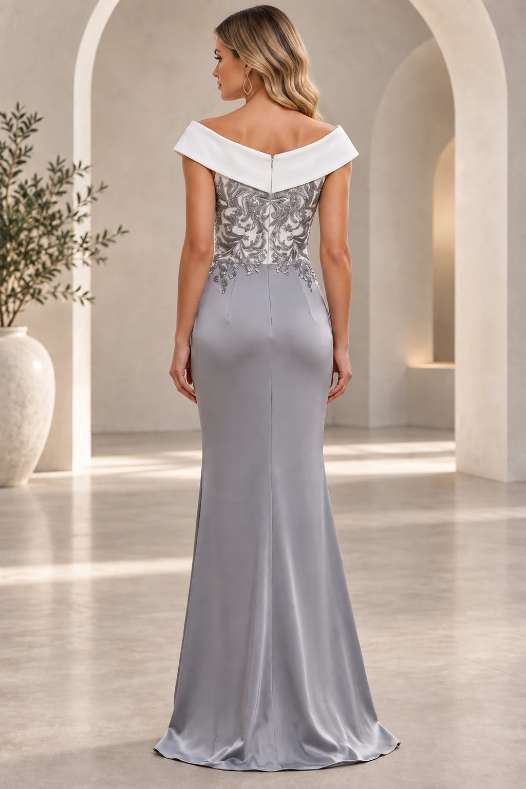 Back view of silver gray Mother of the Bride Dress with off-the-shoulder neckline, embellished bodice and fitted floor-length skirt